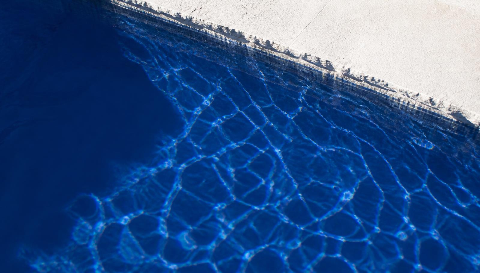 Sunlit Aegean pool water